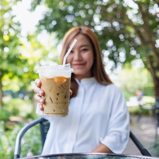 young woman holding a bubble tea