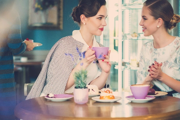 ladies talking about the perfect afternoon tea menu