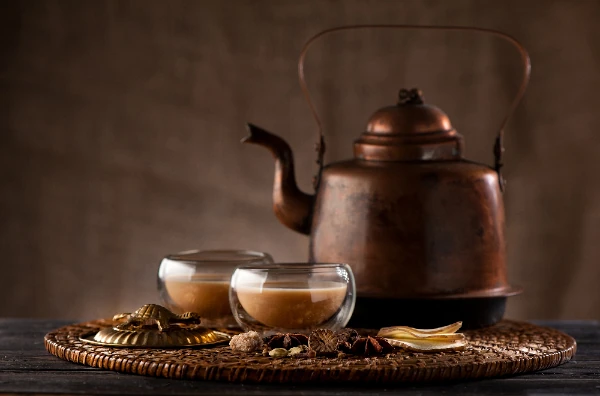 masala chai tea with spices on table