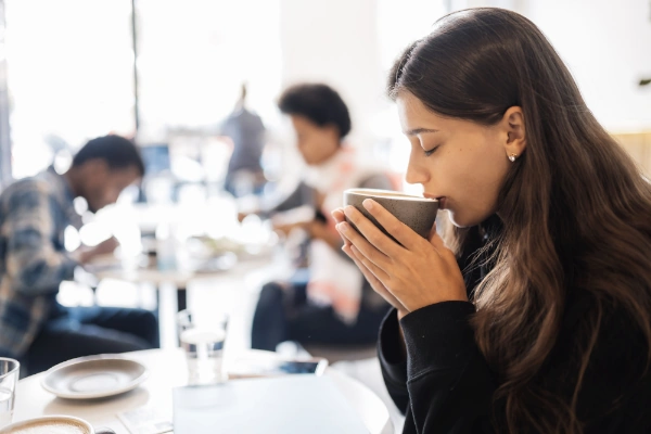 women drinking a perfect cup of tea