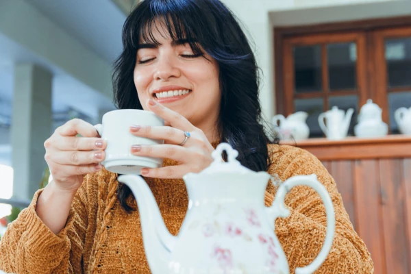 woman drinking tea and enjoying tea puns